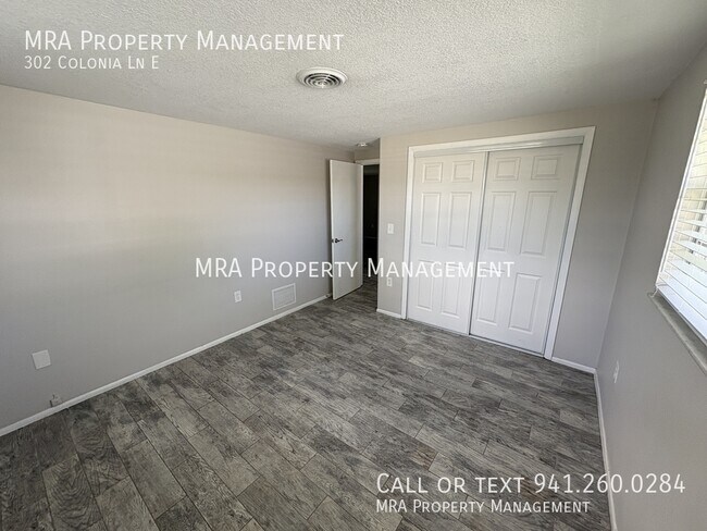 Building Photo - 302 Colonia Ln E