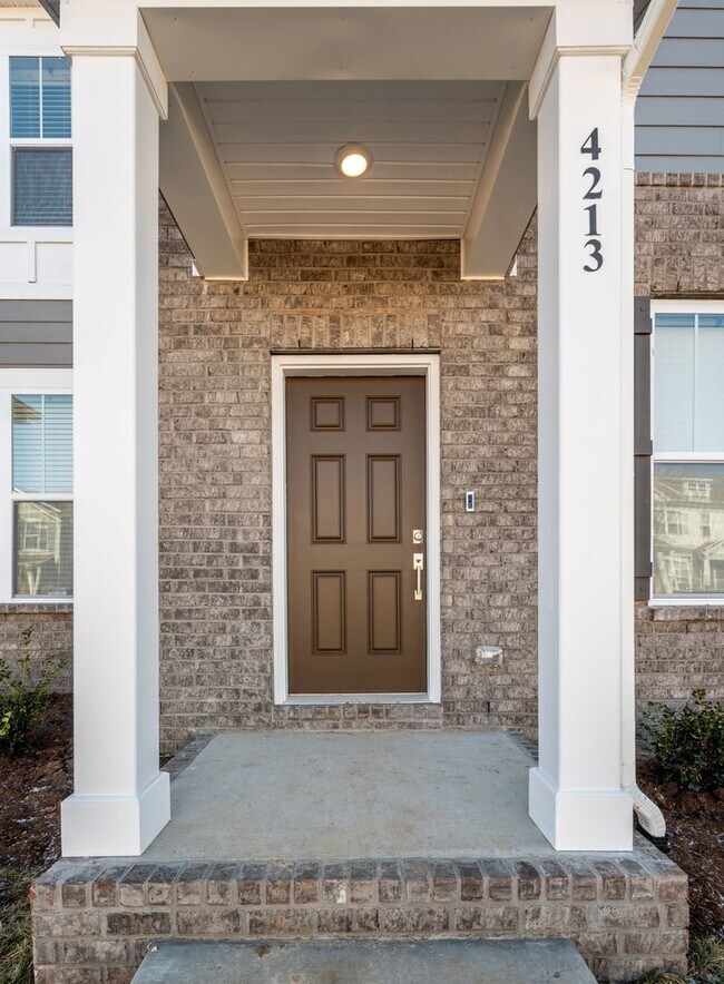 Building Photo - **BE THE LUCKY ONE TO LIVE IN THIS 2022-BUILT END-UNIT TOWNHOME IN BLACKMAN STATION**