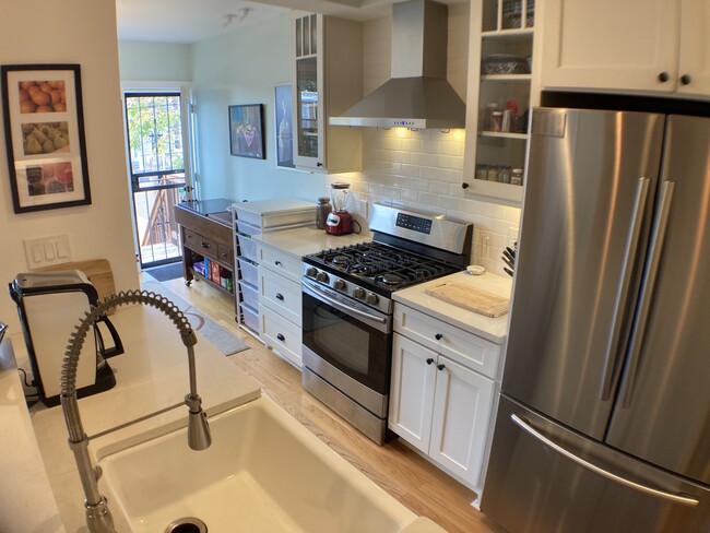 Stainless steel appliances. - 526 24th St NE