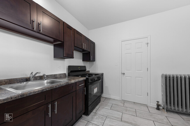 Building Photo - 7451 S Eberhart Ave