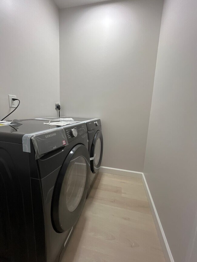 Building Photo - A real stunner! The full renovation is the first thing you'll notice..