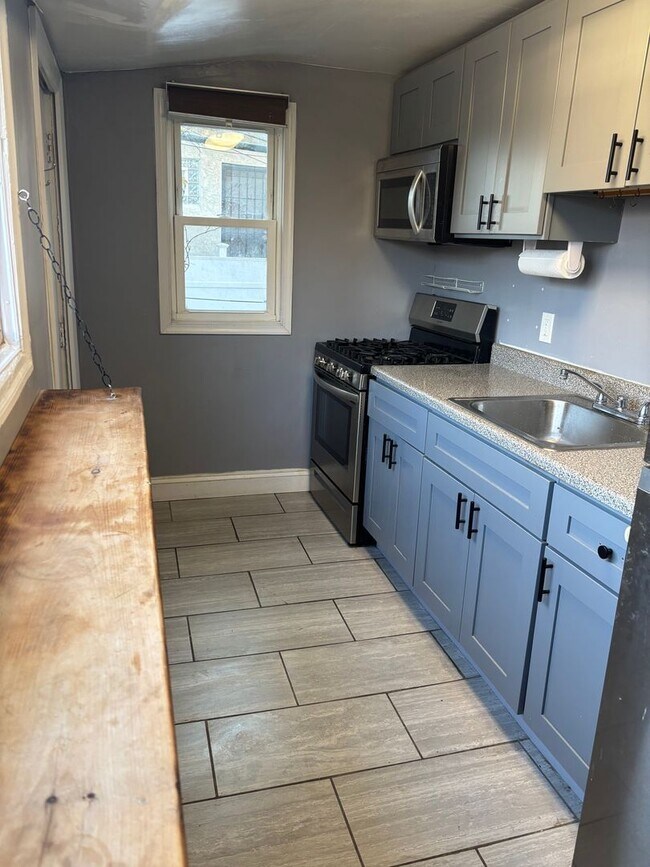 Building Photo - Beautifully Upgraded 2BR/2BA with Modern Finishes & Private Outdoor Space