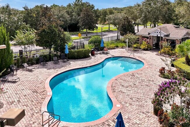 Building Photo - "Stunning 3BR Orlando Home with Private Screened Pool, Spa & Spacious Living Areas"