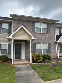 Building Photo - 2 BEDROOM 2 1/2 BATH TOWN HOME