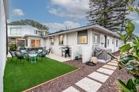 Building Photo - Enjoy stunning sunsets and beach living at its finest, Short Walk to Beach