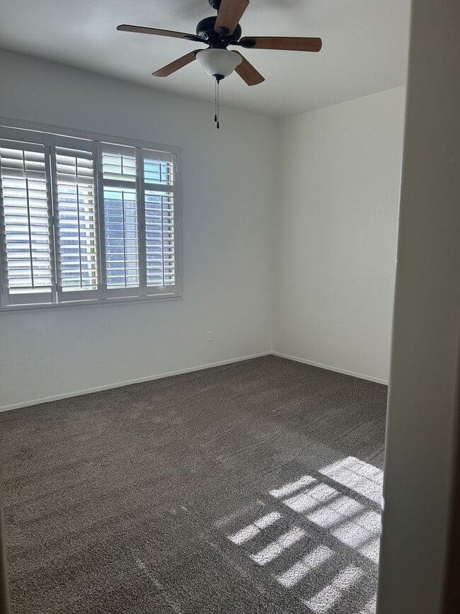 Building Photo - Unfurnished four bedroom large home!  Three car garage