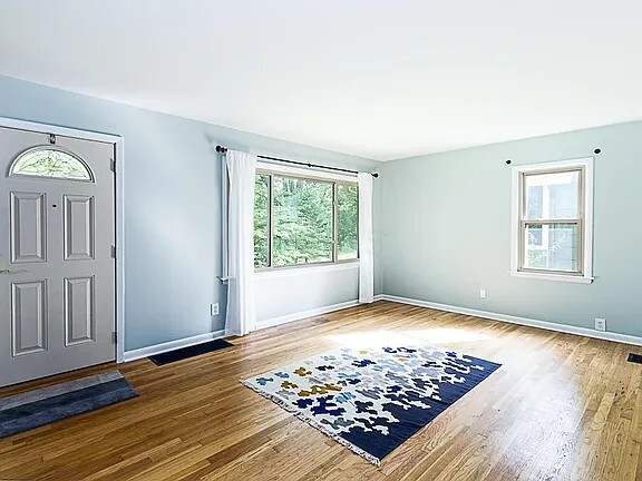 Living room with large window looking out to front yard - 224 Colonial Ave