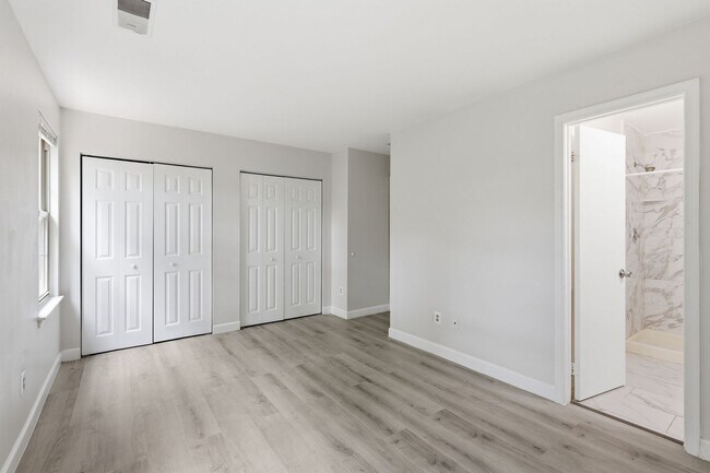 Building Photo - Experience contemporary living in this beautifully renovated residence where modern design meets ...