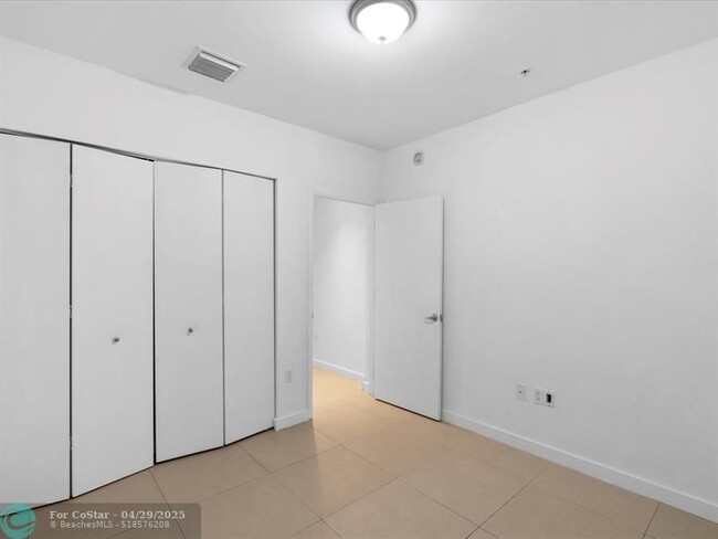 Building Photo - 7901 Hispanola Ave
