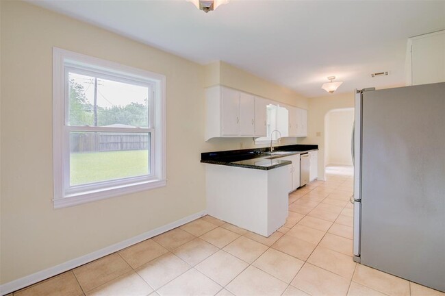 Building Photo - 8807 McAvoy Dr