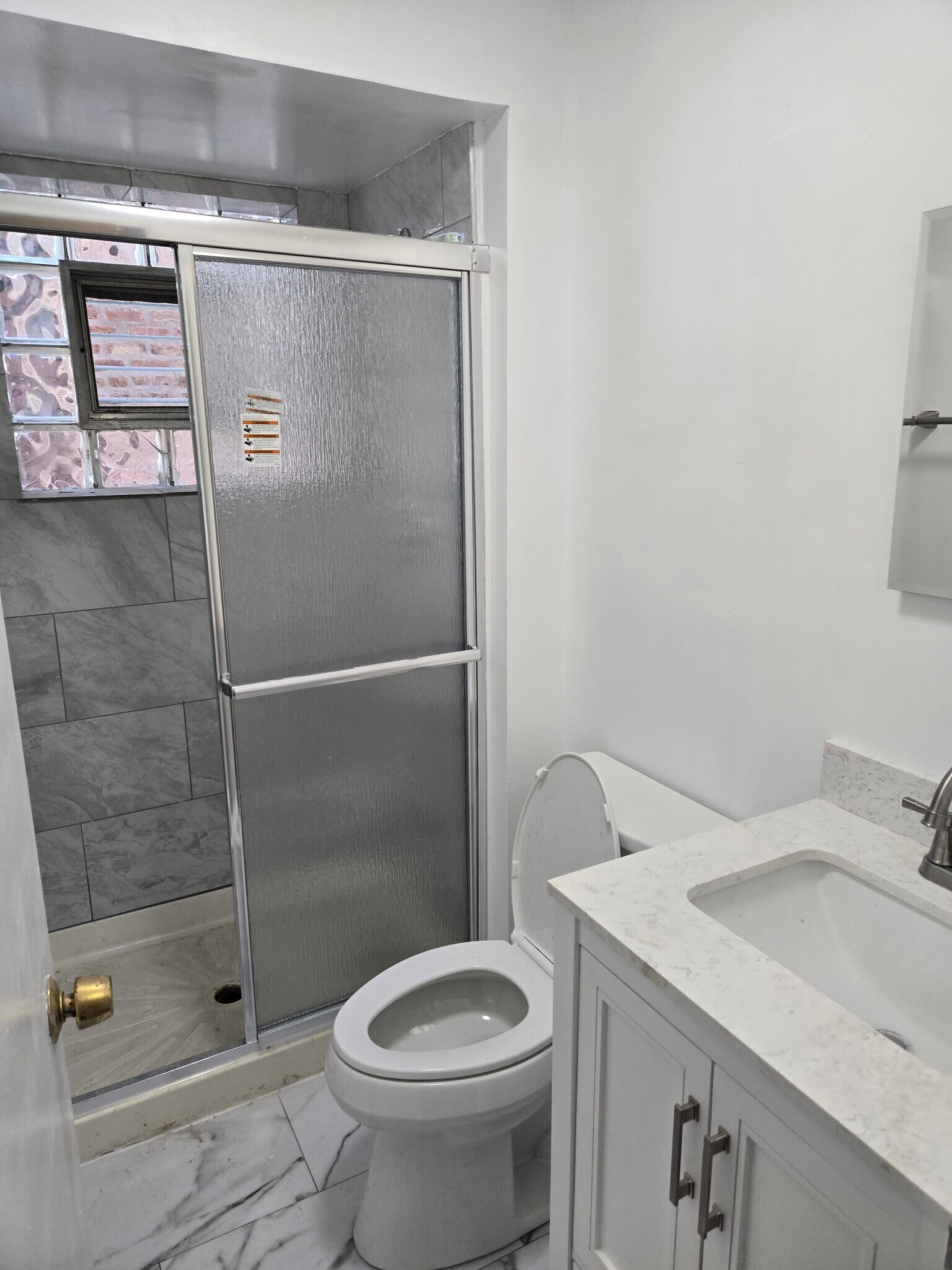 Rear Bathroom - 7529 N. Oakley Ave.