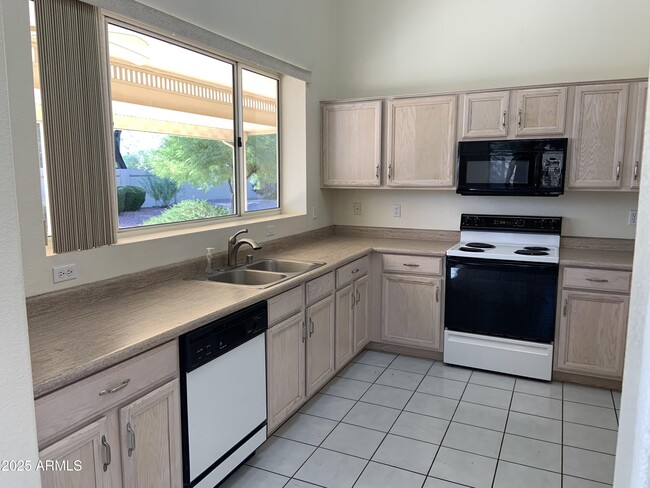 Building Photo - 9069 W Behrend Dr