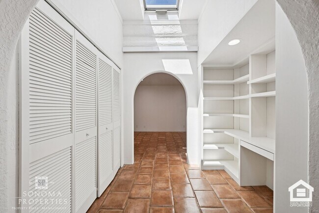 Building Photo - Southwestern Charm Meets Modern Comfort — 2BR/2BA Condo with Access to Shared Pool!