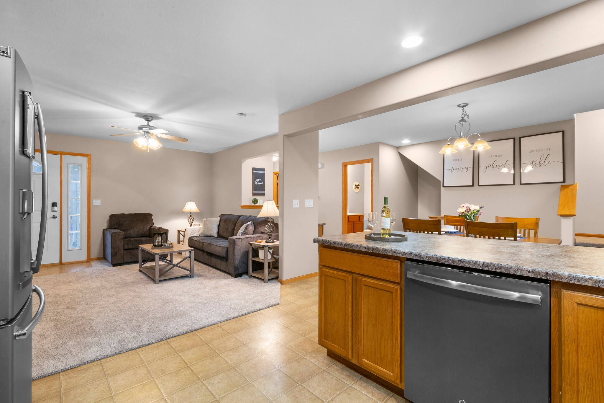 View of shared living room from kitchen. - 115 Alydar Dr