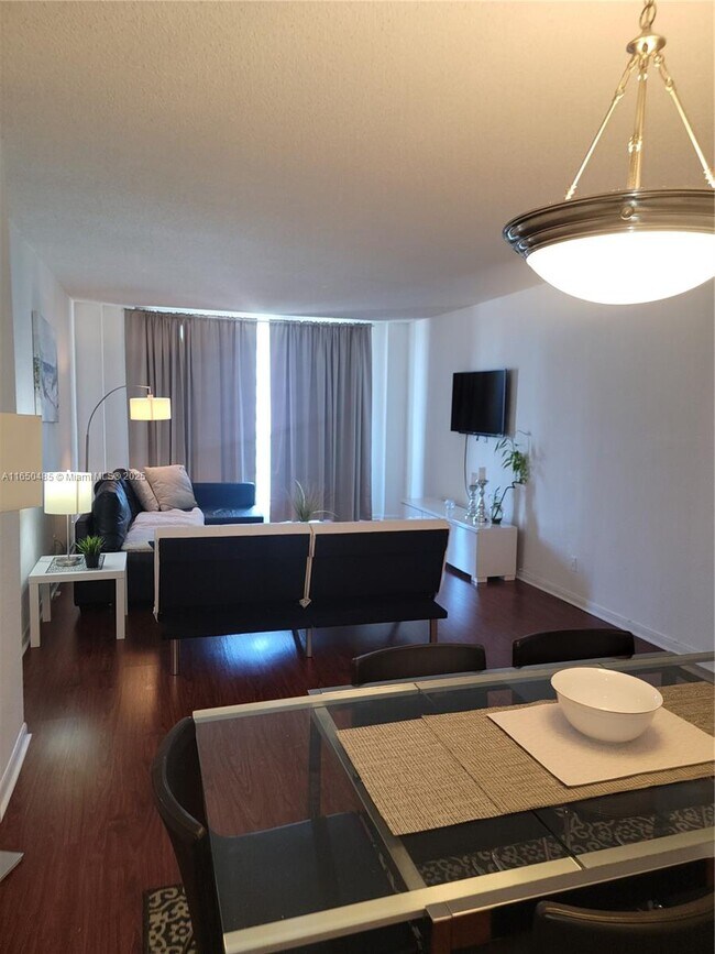 Building Photo - 19380 Collins Ave