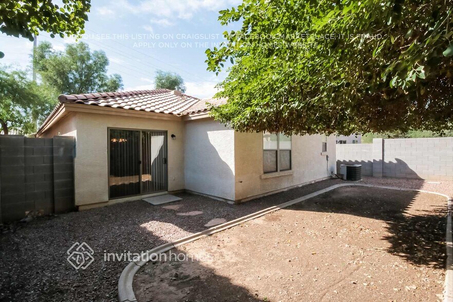 Building Photo - 8852 E Plana Ave