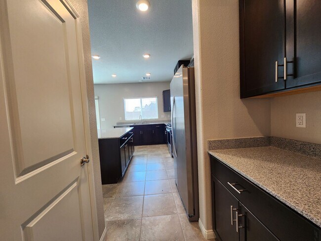 Building Photo - A Fairly New Home with 5 Bedrooms in a gated community