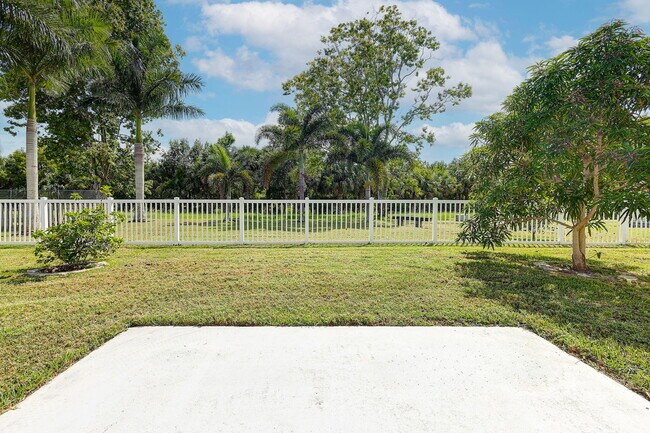 Building Photo - 1612 SE Cascella Ct