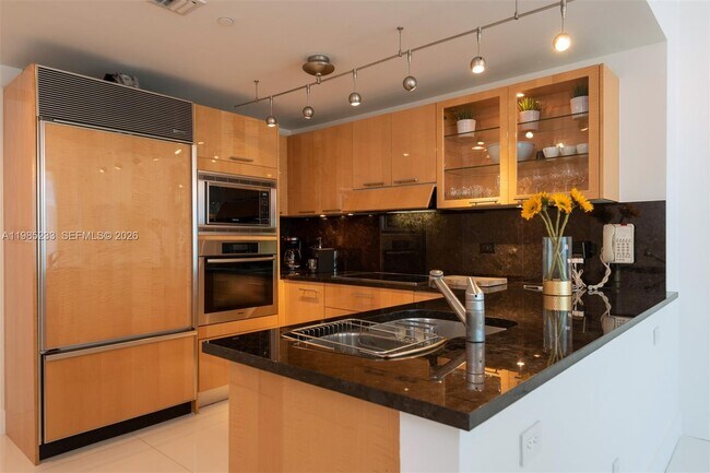 Building Photo - 6799 Collins Ave