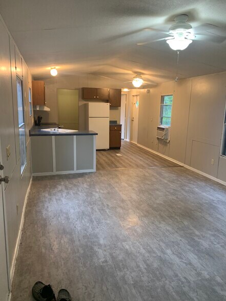 Kitchen with new flooring and attached wash room - 275 Willis Ave