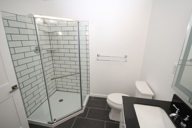 Building Photo - *Coming Soon*  Upgraded End Unit Townhome ...