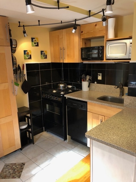 Kitchen is fully stocked and ready for cooking - 2 Emmons Pl