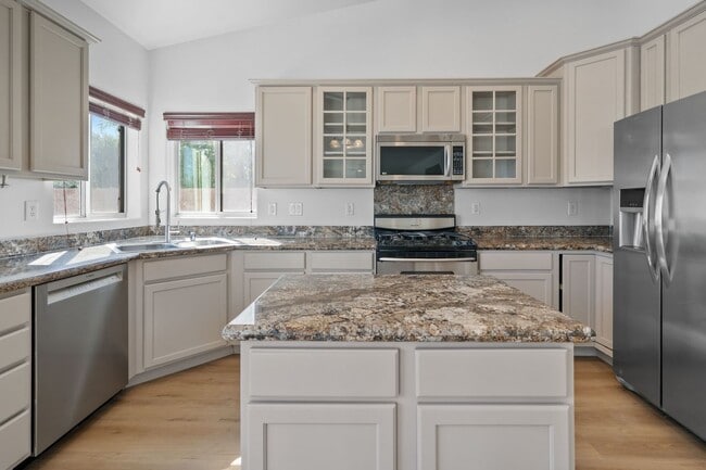 Building Photo - Beautifully Updated 4-Bedroom Home with 3-...