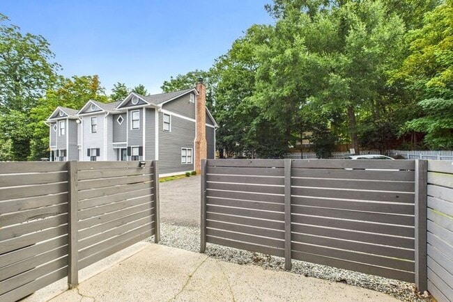 Building Photo - UNCG Area – Chancellors Court Townhomes. Walk to Campus and just minutes to Downtown!