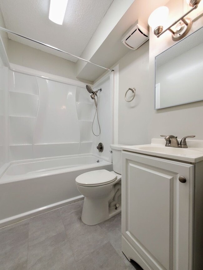 Building Photo - Available Now | Unfurnished 1 Bedroom, 1 Bath 2nd Floor Walk-up with 1 Assigned Parking Stall