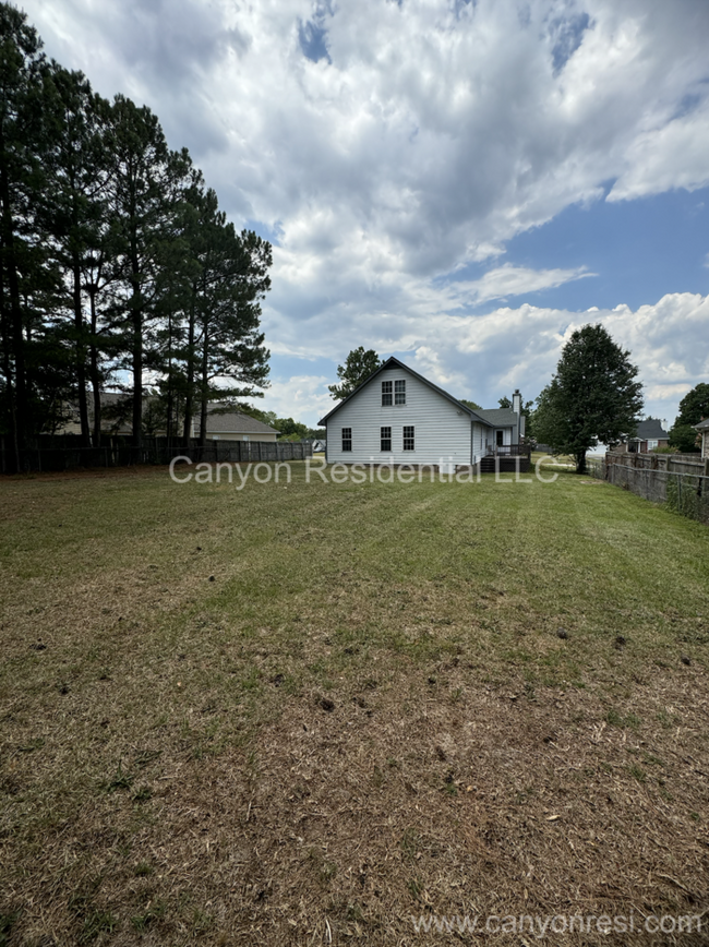 Building Photo - Charming Brick-Front Cul-de-Sac Retreat wi...