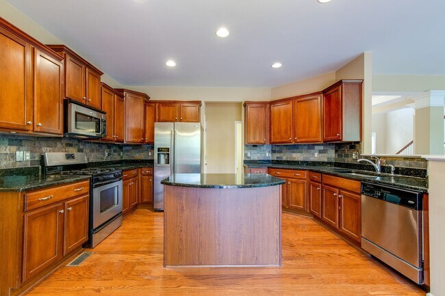 Building Photo - AVAILABLE NOW. 4 Bedroom 3 Bath. Over 3,00...