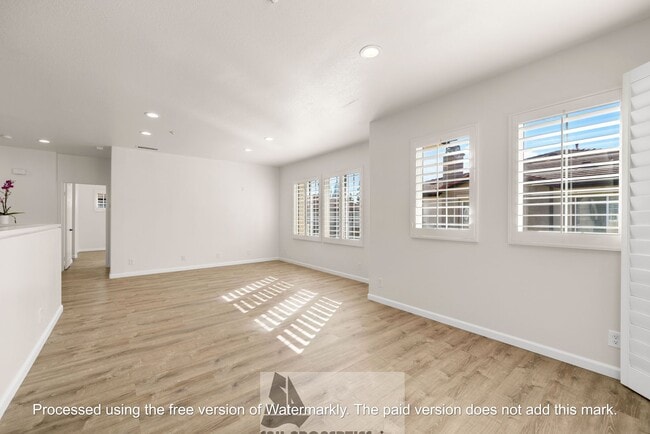 Building Photo - Welcome to this stunning 2-bedroom condo in gated community