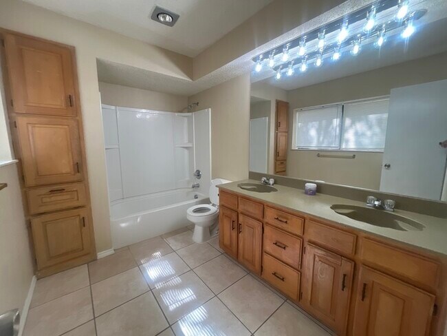 Building Photo - Beautiful 3 bedroom townhome! Master downstairs Large living room, wet bar, Garage! Coming soon i...