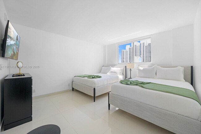 Building Photo - 19370 Collins Ave