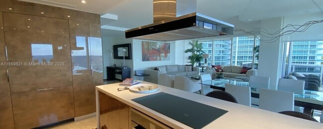Building Photo - 10275 Collins Ave