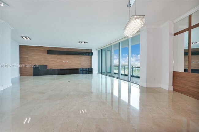 Building Photo - 10295 Collins Ave