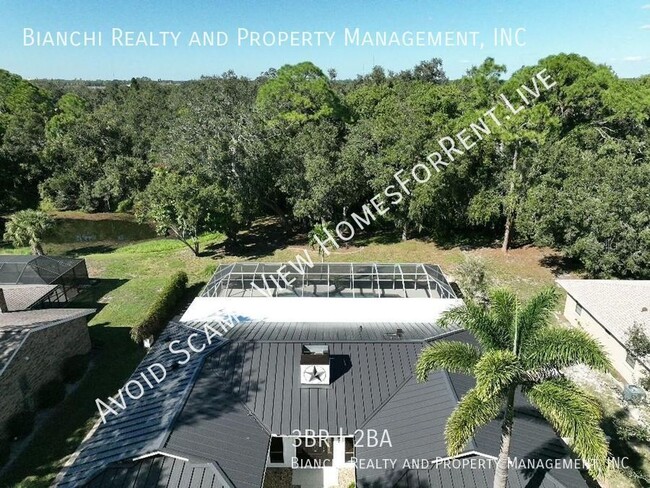 Building Photo - 3/2 Pool Home with Lake and Preserve Views!