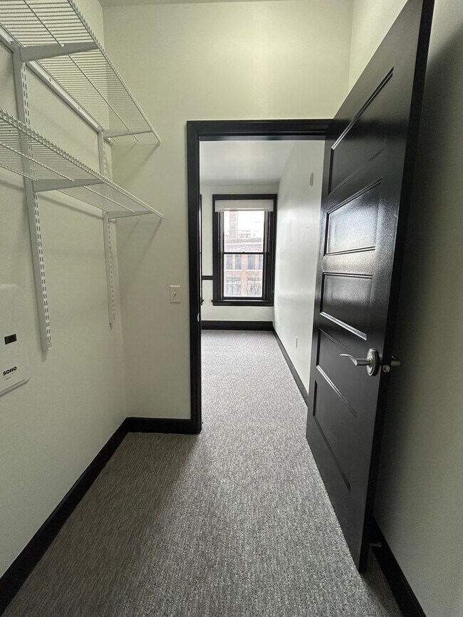 Building Photo - Sleek Downtown Living with a Modern Edge