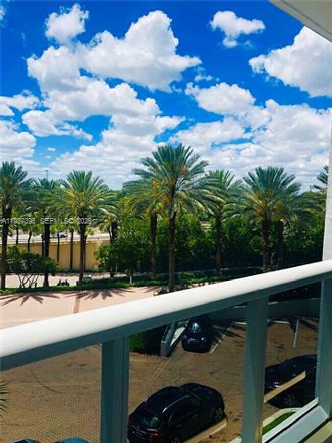 Building Photo - 10275 Collins Ave