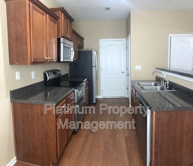 Building Photo - 6583 Silk Tree Pointe