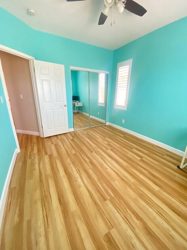 Building Photo - Spacious 5-Bedroom Home with Solar, Stunning Sunroom & Upgraded Bathrooms!