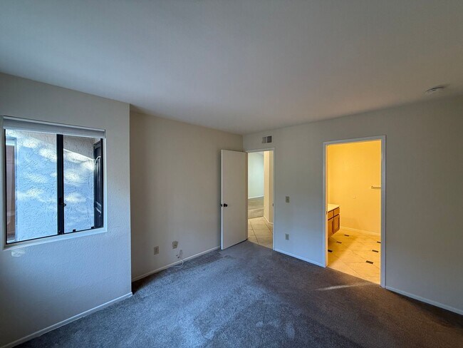 Building Photo - Lovely 2B/2BA Condo in 55+ Community w/Attached Garage & 2 Private Patios!