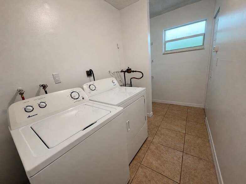 In-Unit Laundry Room - 9371 Fontainebleau Blvd