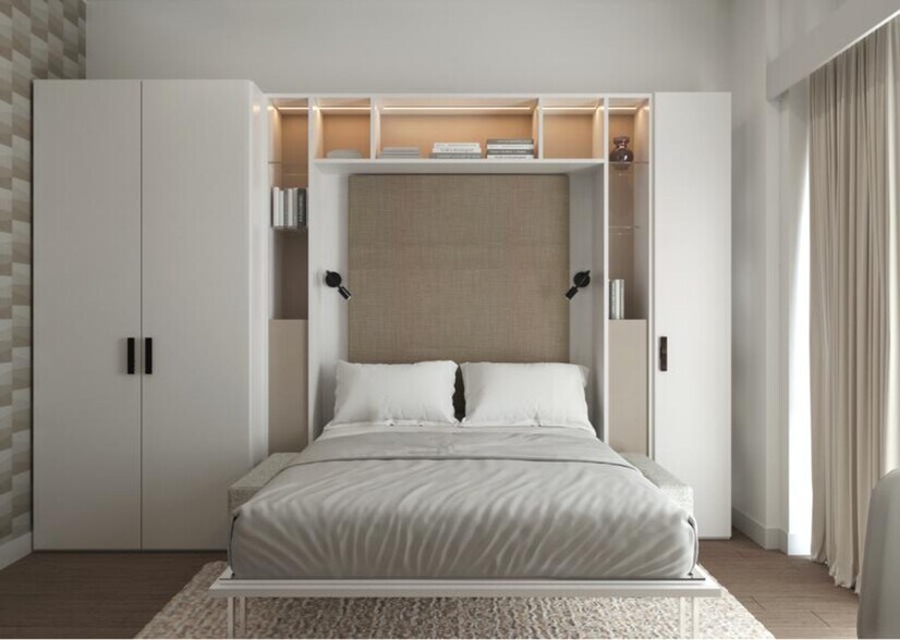 Building Photo - Spacious Furnished Studio in Prime Luxury Building