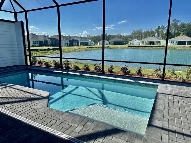 Building Photo - Gorgeous Home with a Private Pool Ready to...