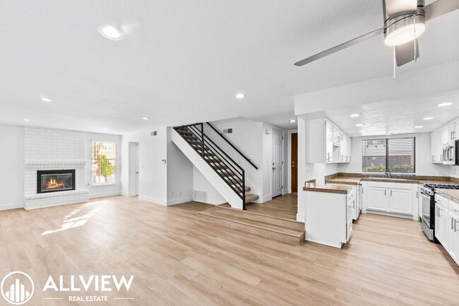 Building Photo - Upgraded 2-Bedroom Townhome in the Gated C...