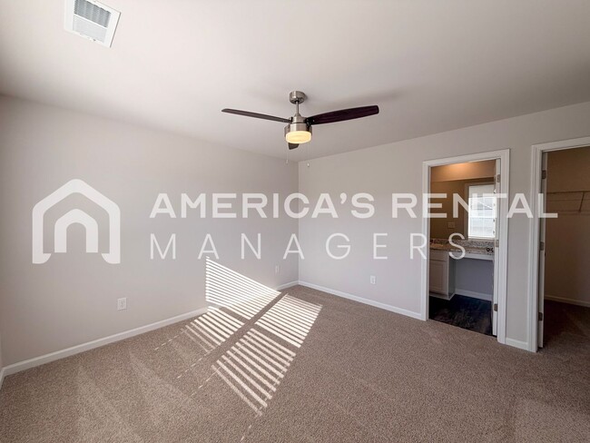 Building Photo - Spacious Two-Story Townhome with Open Layout!