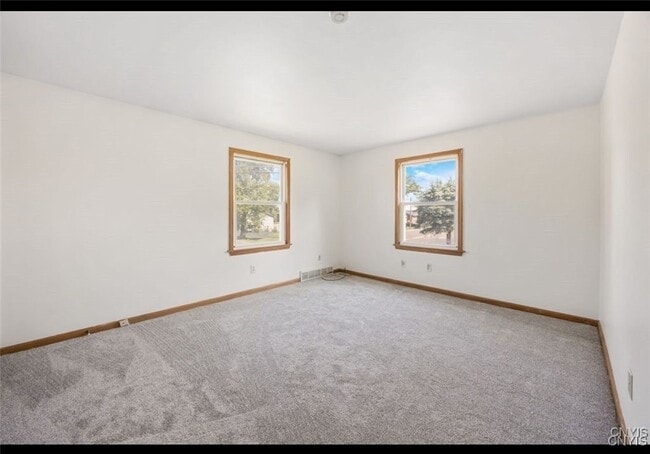 Building Photo - 5696 Caughdenoy Rd