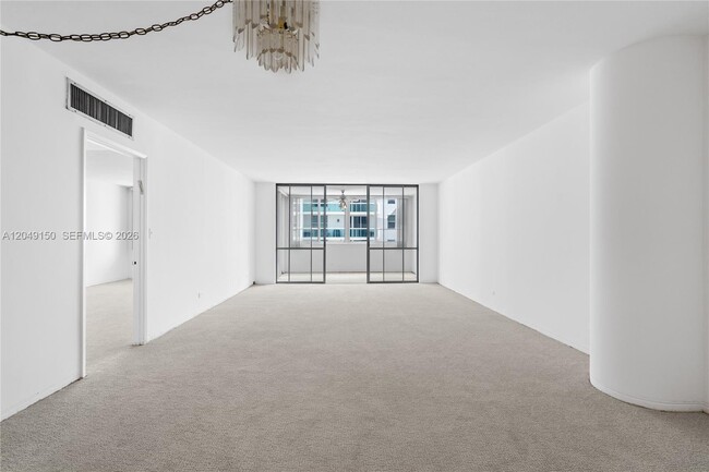 Building Photo - 5005 Collins Ave