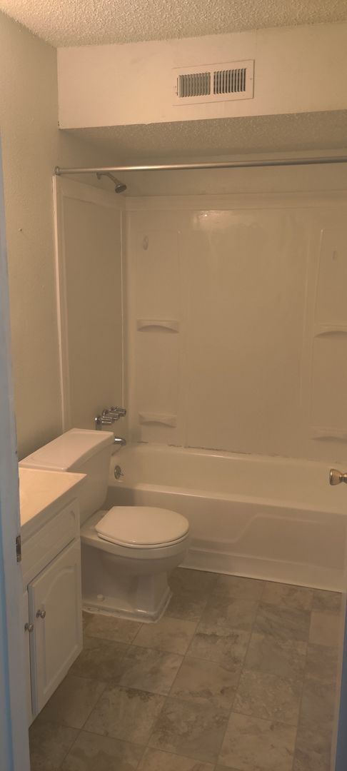 Building Photo - Ground Floor Two bedroom condo
